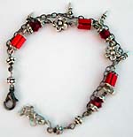 Flower motif double black chain fashion bracelet with red glass bugle beads connected