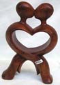 Heart love cross leg kissing couple abstract carving stand
