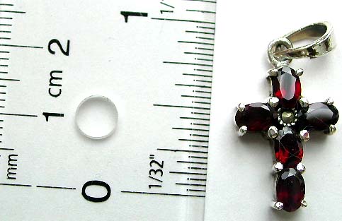 Multi mini marcasites and red garnet stones forming sterling silver pendant 