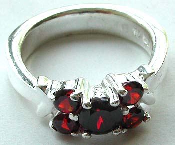 5 rounded red cz forming flower pattern design sterling silver ring
