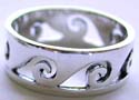 Sterling silver ring with carved-out wavy pattern design
