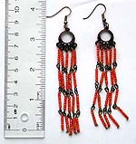 Fashion earring with metal ring shape pattern holding multi orange color beaded dangle