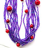 Tibetan style, tribe multi mini purple beaded strings fashion necklace embedded with bigger red bead along the strings