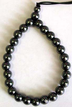 Multi rounded hematite beads forming fashion stretchy hematite bracelet with guava pattern set in middle