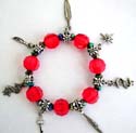 Multi red color facet beads and silver beaded fashion charm strecthcy bracelet with assorted design figure, leaf, cross, triangle, key and dollar sign
