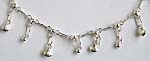 Seashell pattern sterling silver anklet with a mini bell attached at the end
