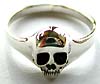 Sterling silver ring with skull motif set in middle