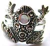 Multi marcasites forming frog pattern sterling silver ring with a rounded mother of pearl seashell embedded on the frog head