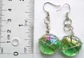 Double loop fashion earring with wired-in transparent green glass bead suspended on bottom, fish hook end for convenience closure