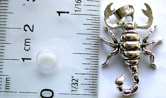 Carved-out scorpio design sterling silver pendant                      

