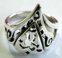 925. sterling silver ring with carved-out pattern decor at center