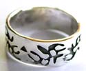 Sterling silver ring with carved-in black tattoo pattern decor 