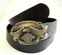 Black imitation leather belt with eagle motor "Henry-Diamon Clothes American Legend" metal buckle at center 