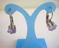 Fashion earring with a rounded light purple cz stone inalid, clip-in back for convenience closure 