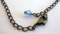 Fashion black chain necklace with multi blue diamond shape rhinestone forming web shape pendant decor at center 