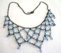 Fashion black chain necklace with multi blue diamond shape rhinestone forming web shape pendant decor at center 