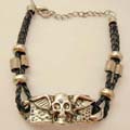 Fashion pendant bracelet in black rope design and skull with wings pattern 