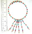 Fashion necklace with turquoise and agent beads, 6 dangles design at the center and each dangles holding a bell at the end