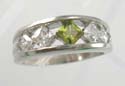 Fashion ring with lime green cz in middle and two clear cz beside, made brass base and rhodium plated