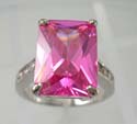 Rhodium plated princess cut pink cz ring with multi mini clear cz on both sides, brass base