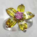 Flower-shaped rhodium plated ring with yellow and pink cz stones embedded, made brass base