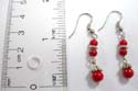 Fashion fish hook earring with Bali silver beads paired with two small and one large red faux stone