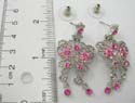 Fashion cut-out butterfly earring with multi pink cz stone embedded holding 2 pink cz dangle hanging on bottom. Post back