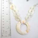 Fashion long chain earrings holding circular seashell paired with multi rounded seashell necklace