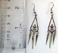 Geometrical design fashion earring with carved-out floral pattern decor inside and 3 metal dangle hanging on bottom