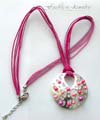 Fashion necklace in multi pinkish string design with a multi color beads decor rounded pendant at center