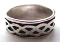 925. sterling silver ring in black color with carved-out Cetic knot work design 