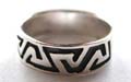 925. sterling silver ring with carved-out puzzle pattern design 