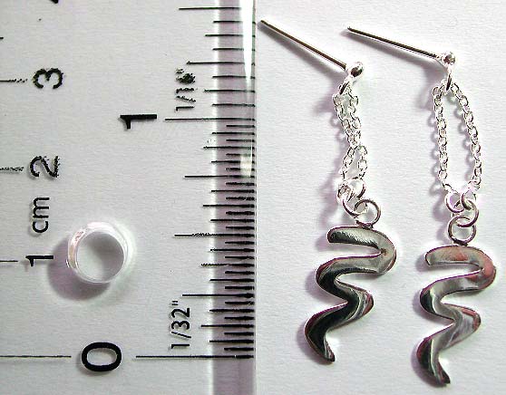 Stud earring in stamped 925. sterling silver setting with mini chain loop holding a snake pattern on bottom        