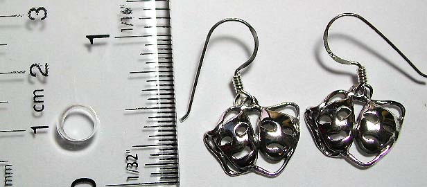 Fish hook back sterling silver earring with carved-out double face pattern design        
