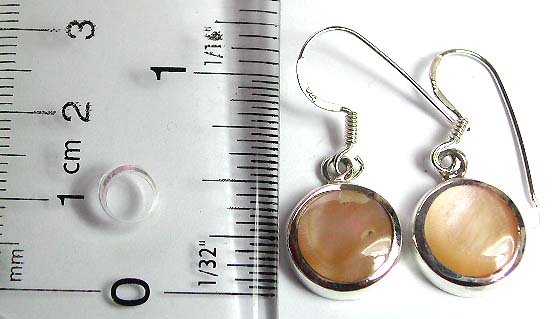 Sterling silver earring in circular pattern design with rounded orange color genuine seashell stone