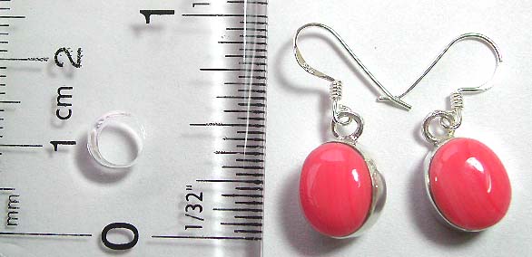 Fish hook back sterling silver earring with a genuine oval shape pinkish stone