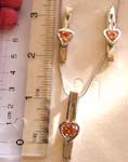Fashion jewelry set, snake chain necklace holding a rounded orange cz stone embedded heart love pattern on long strip pendant at center, same design stud earring set 