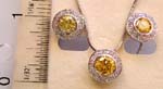 Multi mini clear cz surrounded a yellow cz stone pendant necklace and earring set 