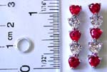Fashion stud earring in 3 garnet and 2 clear heart shape czs forming string dangle design