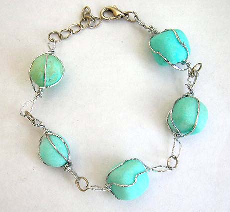 Multi chained-in blue stone forming fashion bracelet