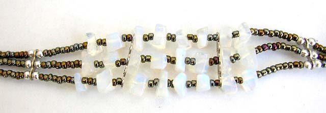 Fashion Tibetan bracelet in triple beaded string design with multi clear quartz chips