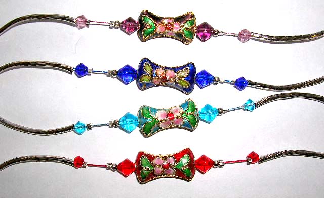 Fashion bracelet with curved long strip and diamond shape color beads inlay holding a fan shape handmade enamel cloisonne flower bead at center