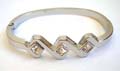 Fashion bangle bracelet with 3 mini diamond shape clear cz embedded wave pattern design at center