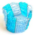 Fashion stretchy bracelet in multi dark and light blue beaded string design