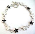 Fashion bracelet in multi enamel black and white star face pattern design, with toggle jewelry clasp for convenience closure
