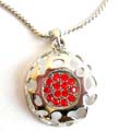Fashion necklace in twisted chain design with carved-out pattern decor multi red cz embedded circular pendant decor at center