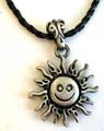Fashion necklace with black twisted imitation leather string holding a sun shine metal pendant at center