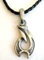 Fashion necklace with black twisted imitation leather string holding a Celtic tattoo metal pendant at center