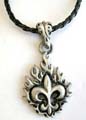 Fashion necklace with black twisted imitation leather string holding a mystic flaming metal pendant at center