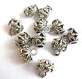 Silver plated bead in carved-out diasy flower pattern decor, cylinder shape pattern design